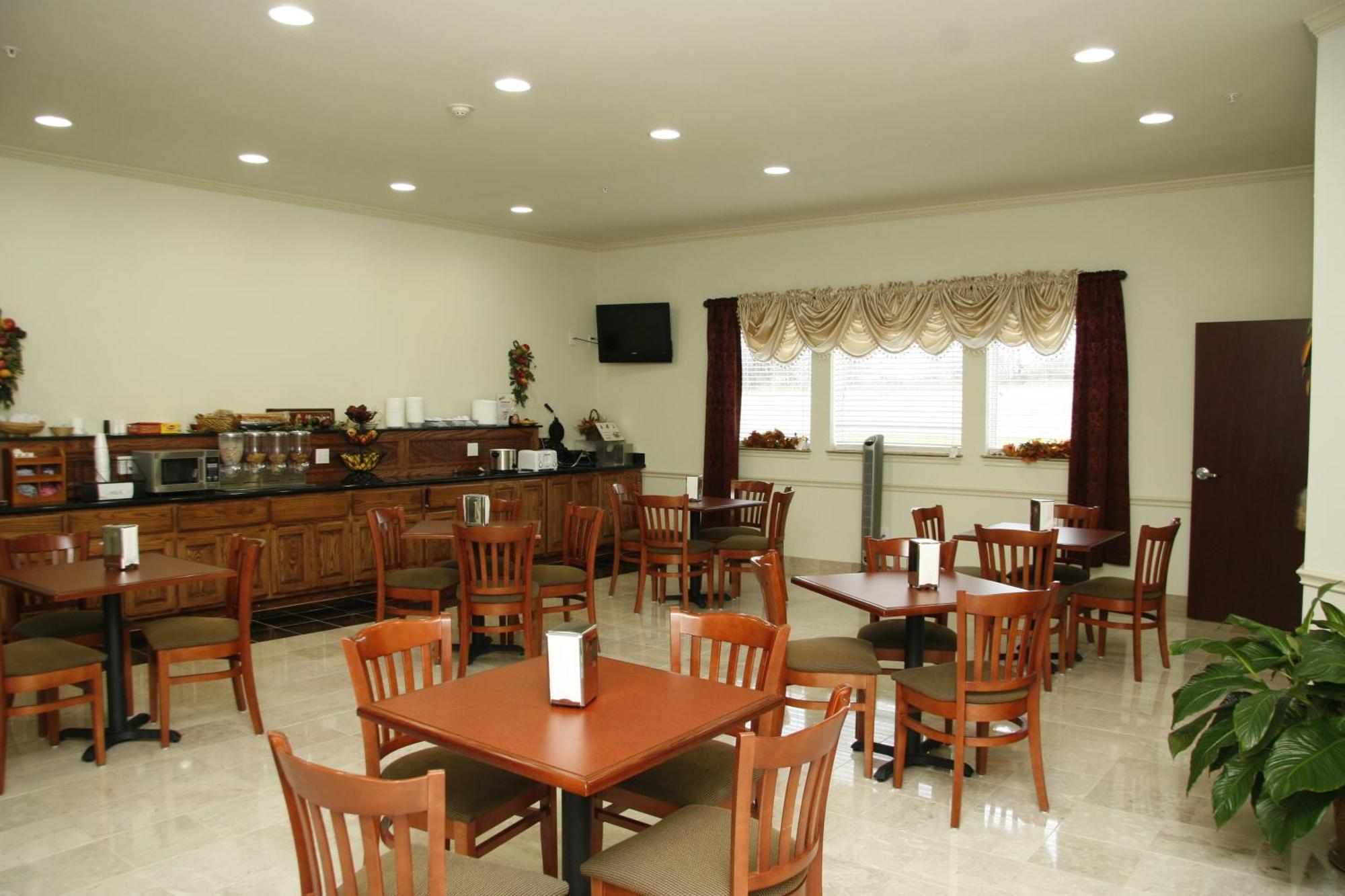 Budget Host Inn And Suites Cameron Ruang foto
